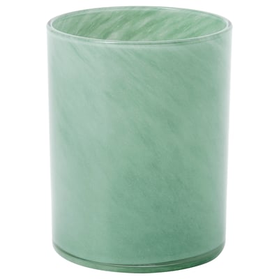 Green, cylindrical glass candle holder with swirl design.