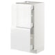 Белый глянцевый кухонный шкаф с выдвижными ящиками.