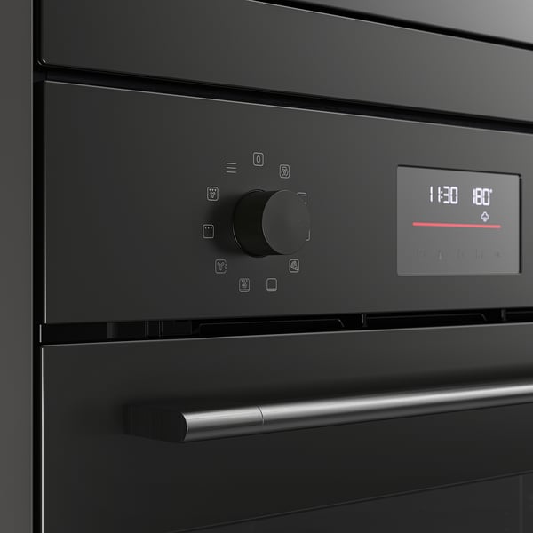 Black high-tech oven with sleek knobs and digital display. Modern and user-friendly controls for precise cooking.