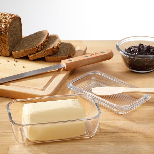 GRYNSOPP butter dish set includes glass container & lid. Holds 300g butter, fits fridge & table. Clear, rectangular, thick glass.