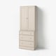 A beige HAVSTA storage unit with doors and drawers, made of wood.