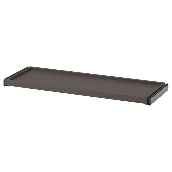 A dark grey KOMPLEMENT pull-out tray for wardrobes, rectangular, with a smooth surface and edge detailing.