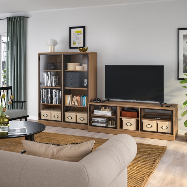 Modern living room with LANESUND tv stand and shelves, a neutral sofa, and rug.