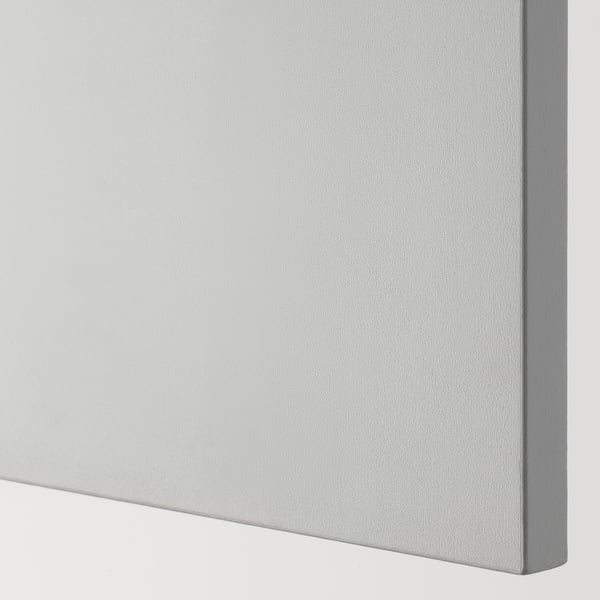 Close-up of smoothly painted grey wooden panel edge, showing high-quality finish and bevelled design.