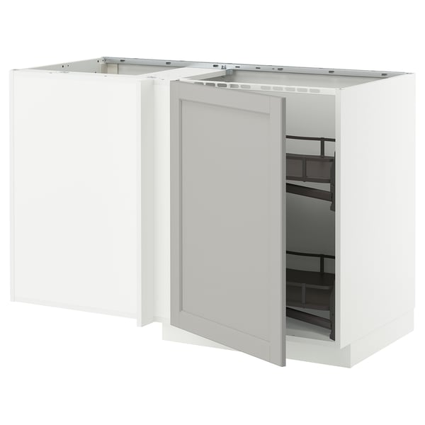 White ikea METOD kitchen cabinet with open door, showing pull-out shelves.