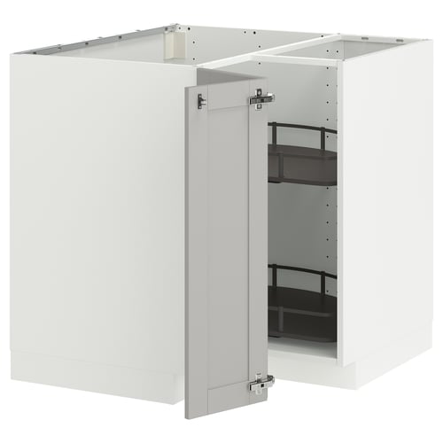 White METOD kitchen cabinet with shelves open for organization.