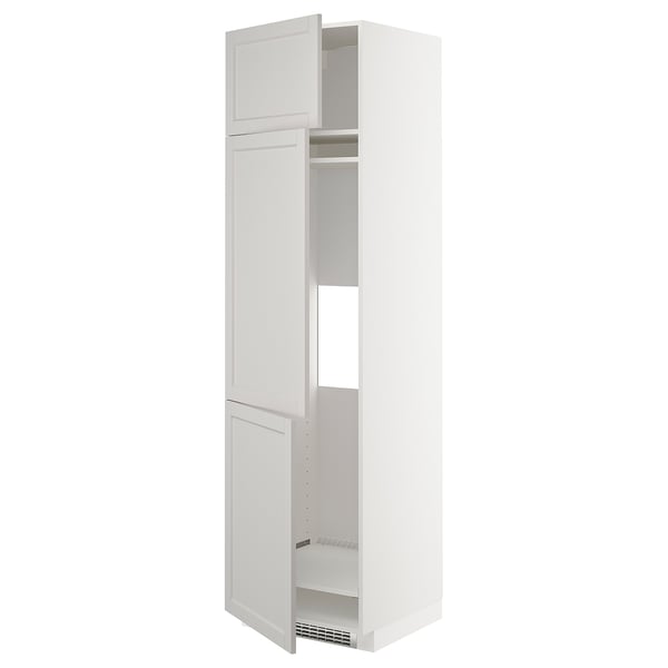 White METOD kitchen cabinet with adjustable shelves and beveled edges.