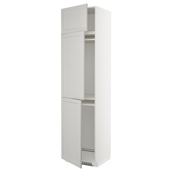 White METOD kitchen cabinet with light grey lerhyttan fronts. Tall, rectangular, two-door design with bevelled edges.