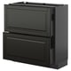 Black METOD kitchen cabinet with sleek drawers.