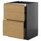 Modern kitchen unit with two wood-effect drawers and dark frame.