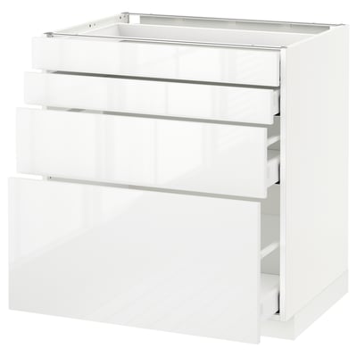 White METOD kitchen cabinet with four high-gloss drawers for storage.