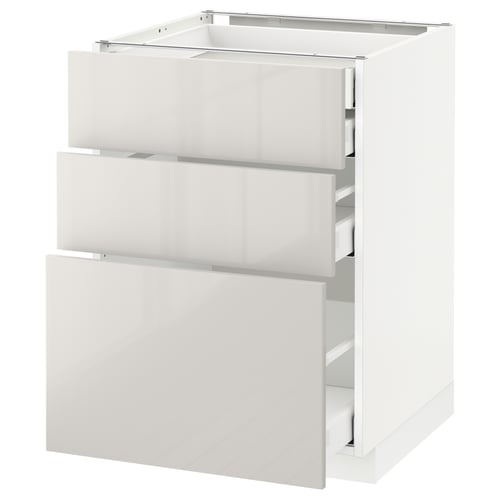 A white METOD kitchen cabinet with three drawers, featuring a sleek, modern design in glossy finish.
