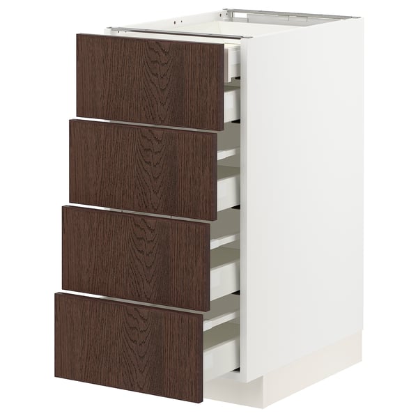 White METOD kitchen unit with four dark brown wooden drawers, sleek modern design.