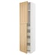 A white METOD kitchen cabinet with two light wood doors open, revealing shelves inside.