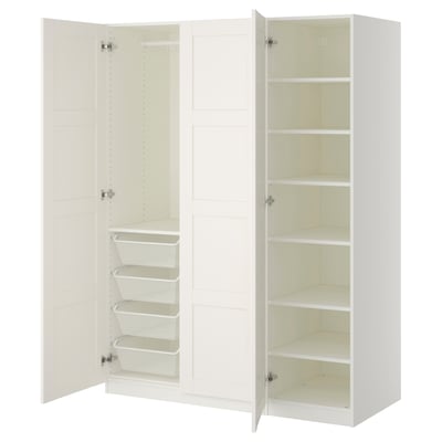 A white PAX wardrobe with open doors, mesh baskets, and multiple shelves.