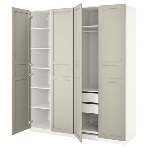 A beige ikea PAX wardrobe with open doors, showcasing adjustable shelves and a hanging section.