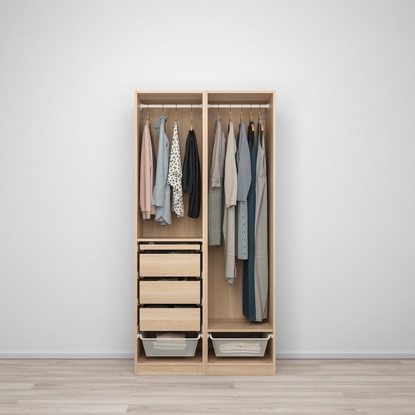 Wooden wardrobe with clothes hangers, drawers, baskets.
