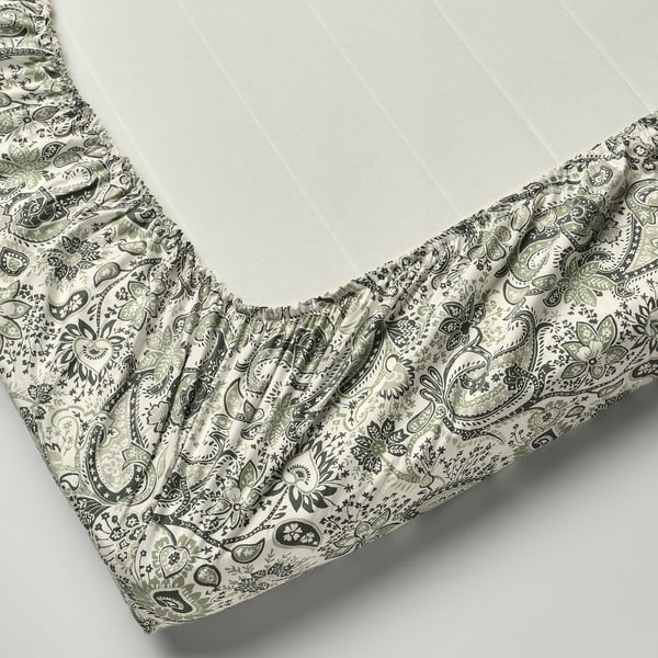 Fitted sheet with paisley pattern, elastic edging, soft cotton-viscose blend, fits mattresses up to 26 cm.