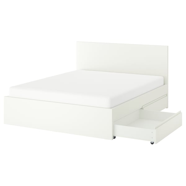 The STORKLINTAhite bed a white minimalist design with sturdy construction. It includes drawer storage under the built-in mattress platform.