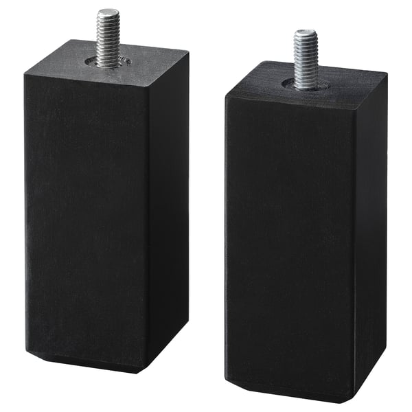 Two black cubic wooden STUBBARP legs with metal screws on top, providing adjustable support.
