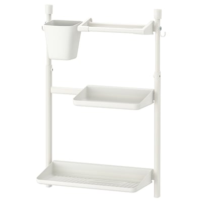 A white SUNNERSTA kitchen rack with multiple shelves and a hanging basket, made of polypropylene plastic, designed for efficient storage and draining.