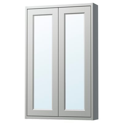 A TÄNNFORSEN light grey mirror wall cabinet with bevelled panels. It has a rectangular shape with two doors and a glass shelf inside.