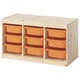 The TROFAST storage unit has bright orange plastic bins in a light wooden frame, storing kids items neatly in a practical design.
