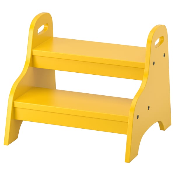 Bright yellow kids step stool; sturdy, lightweight with handles; aids reaching, kitchen tasks; fiberboard with glossy coating.