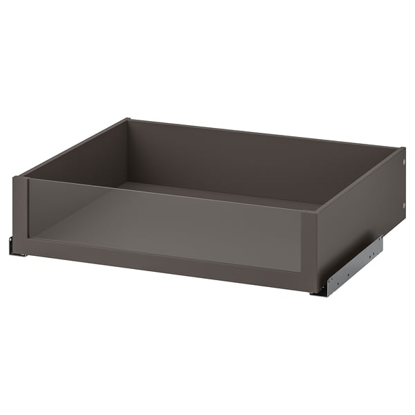 Пустой, современный ящик под названием KOMPLEMENT в темно-сером цвете с элегантным дизайном. Это стеклянная передняя панель для удобного просмотра контента.