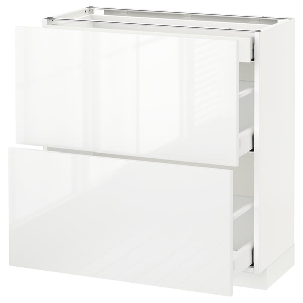 Белый глянцевый кухонный шкаф ikea METOD с несколькими ящиками.