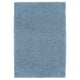 A blue IKEA ALMTJÄRN bath mat, rectangular and soft, made from recycled polyester, offering comfort and absorbency.