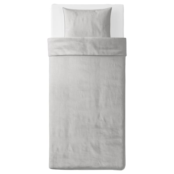 A neatly made bed with the BERGPALM duvet cover set in light grey with classic striped patterns, featuring soft 100% cotton material.