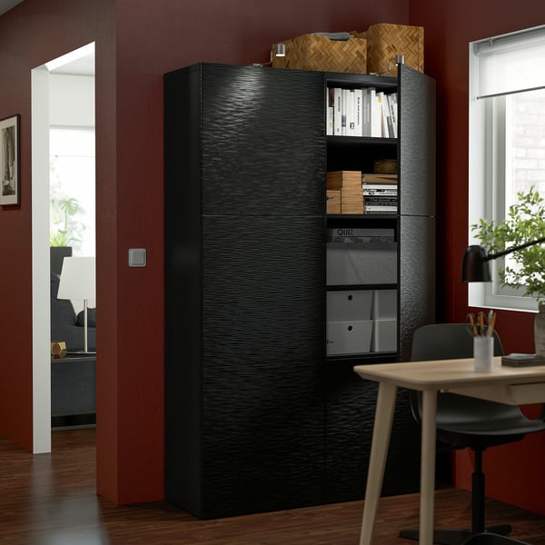 Black storage cabinet with sliding doors, adjustable shelves, and wall-mount option.