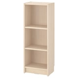 A BILLY bookcase in white. Made of particleboard and fibreboard, it three adjustable shelves and a simple, minimalist design.