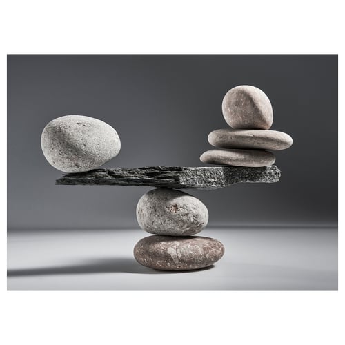 BJÖRKSTA photo canvas, grey, with stacked stones on a narrow black slate, minimalist, nature-inspired design.