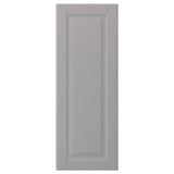 A BODBYN cabinet door in soft grey with bevelled panels, showcasing a classic and traditional design.