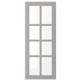 Soft grey BODBYN kitchen door with framed design and bevelled glass.