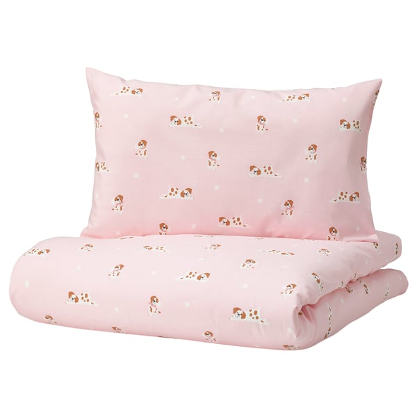Light pink bedding set with puppy print, made of soft cotton. Includes fitted sheet and pillowcase, neatly folded.