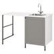 ENHET white laundry unit with grey cabinet, stainless sink, black legs, modern design.