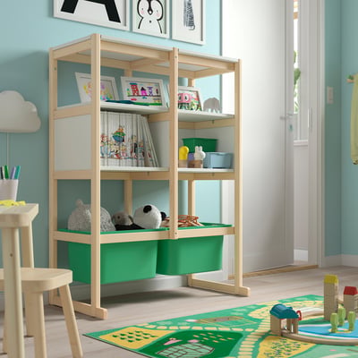 Wooden FLISAT toy storage in kids room. Green trofast boxes, drawing table, road rug, and toys.