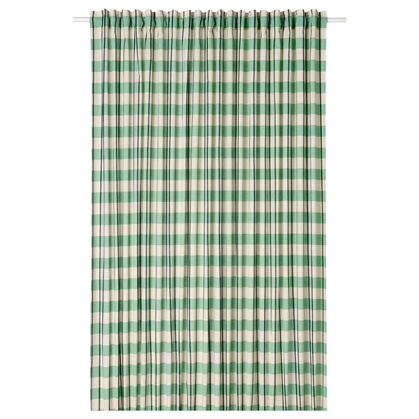 Green and white striped curtain with black stripes hangs straight, made of cotton.