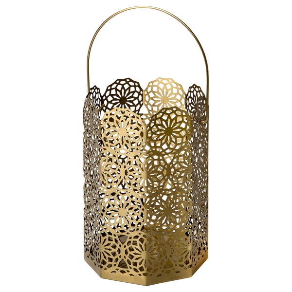 Gold GOKVÄLLÅ lantern, cylindrical shape with floral cutouts, handle on top, made of stainless steel.