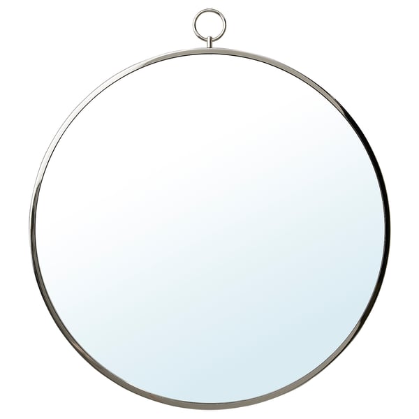 Round, nickel-framed mirror, hangs or stands.