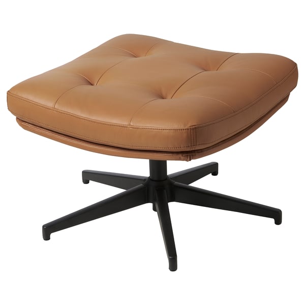 Brown leather footstool with black star base, tufted design.