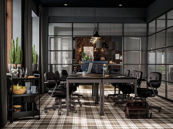 Modern office with IDÅSEN black and grey tables, chairs, and decor; natural light, greenery, and elegant lighting.