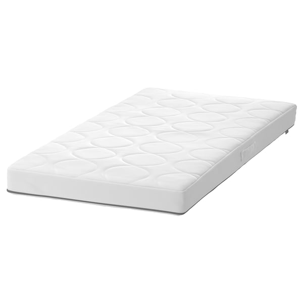 White JÄTTETRÖTT baby mattress, rectangular, quilted pattern, soft edges.