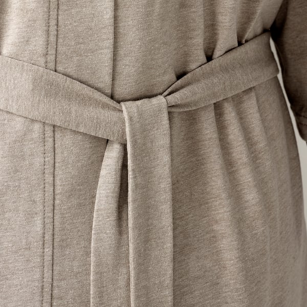 Lightweight, soft bathrobe with adjustable belt and pockets. Ideal for post-shower or lounging, featuring loops for belt securement.