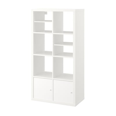 White KALLAX bookshelf with open and closed compartments.