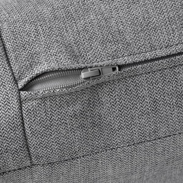 Close-up of grey KIVIK sofa zip, showcasing durable, textured fabric and quality detailing.