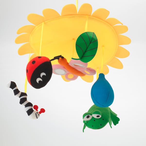 Colourful baby mobile with sun, bug, caterpillar, butterfly, and frog toys.